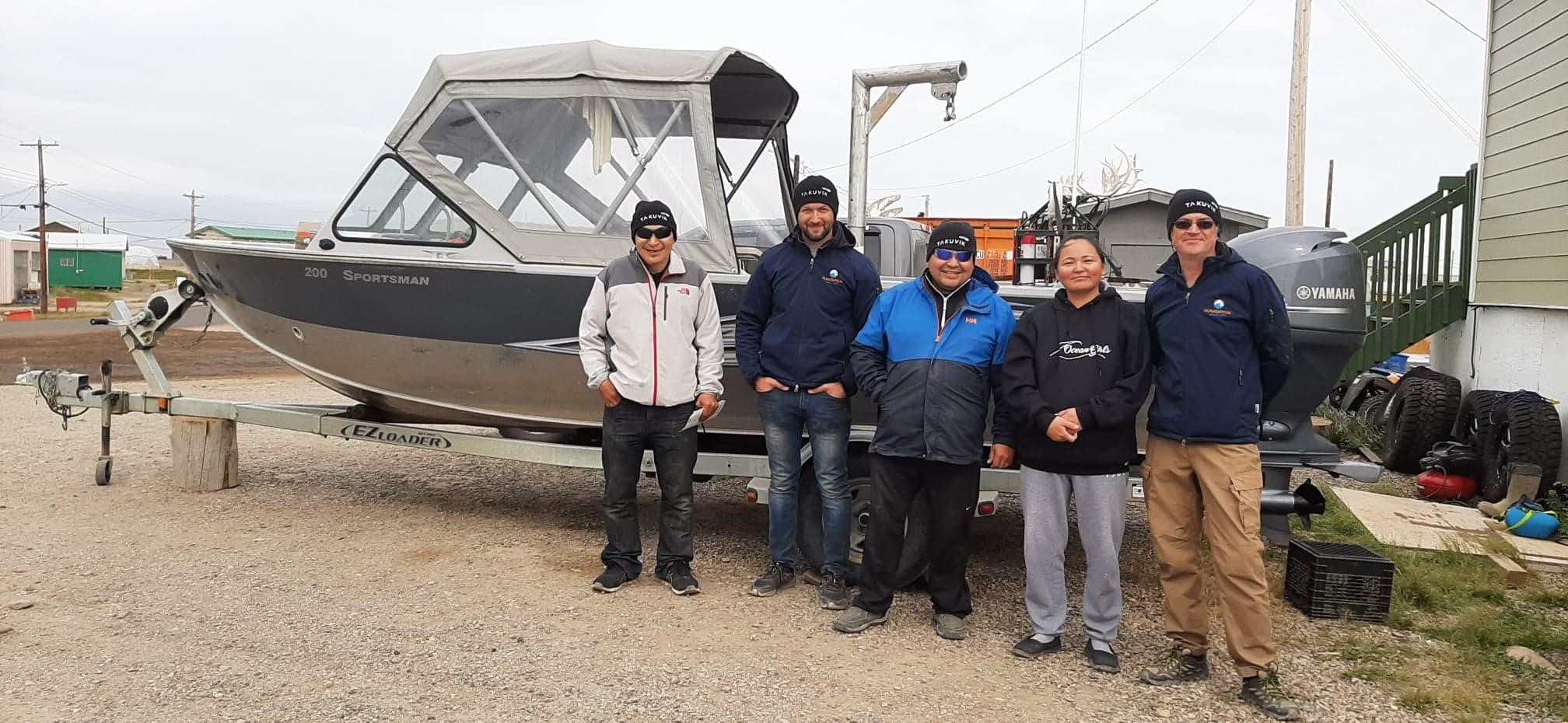 The field team from left to right: David Obie James Anikina (climate monitor), Guislain Bécu (scientist), James Keevik (boat captain), Rachael Keevik (water taxi), Édouard Leymarie (scientist) on August 2, 2019. ©Joannie Ferland Takuvik2019 Picture10 4