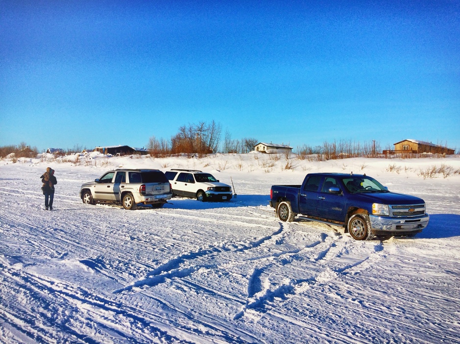 The team takes a wrong turn onto the skidoo trail and is bailed out of the snow by Tumma Kasook and Cody Kogiak in Aklavik, Northwest Territories, Canada, February 25, 2019. ©Martine Lizotte Takuvik2019 Picture2 16