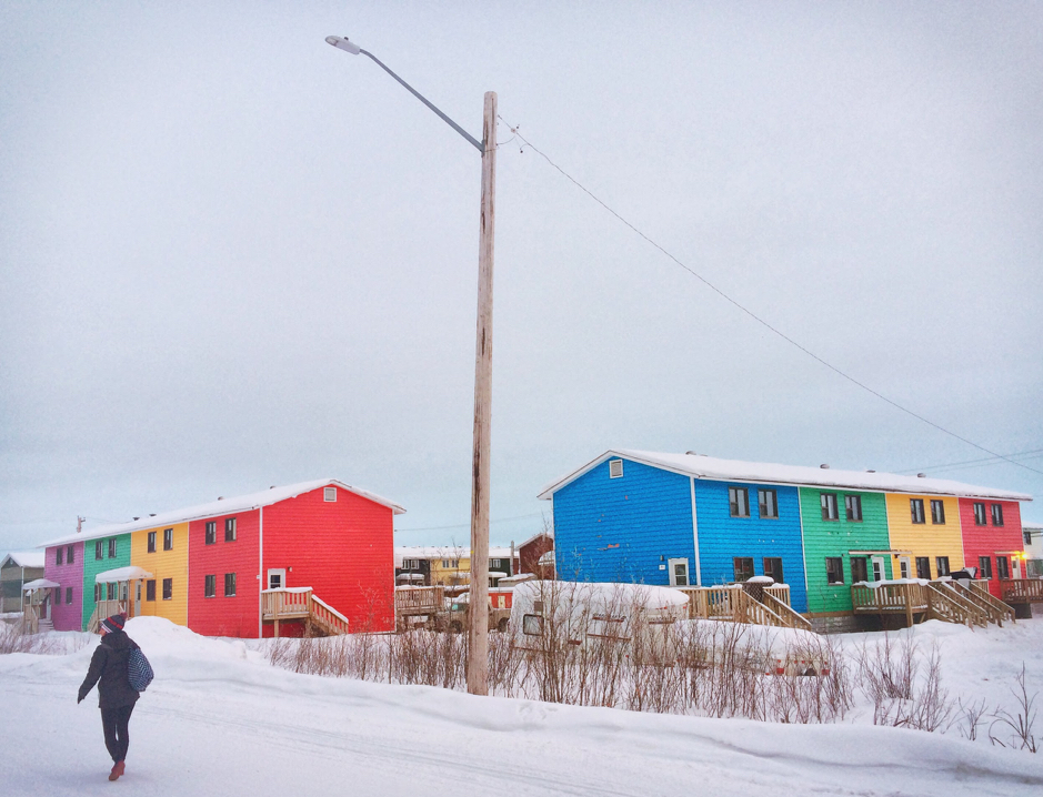 A walk through Inuvik, between Aurora Research Institute (ARI) and the ARI row house where our team is lodging takes us past colorful buildings, in Inuvik, Northwest Territories, Canada, February 22, 2019. On this photo: Gwénaëlle Chaillou. ©Martine Lizotte Takuvik2019 Picture2 9