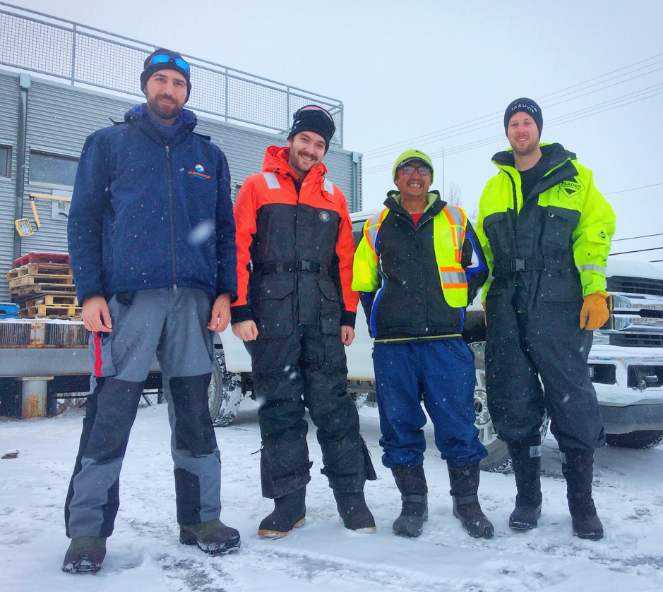 Under the fall of fluffy snow, Laurent Oziel, Thomas Bossé-Demers, Miles Dillon and Bennet Juhls set off for a mock station in a bend of the Mackenzie River near the house of Miles’ uncle, right off the ice road. They will practice ice drilling, ice coring, water sampling and sediment coring in preparation for the first sampling day. April 20, 2019, Inuvik, Northwest Territories. ©Martine Lizotte. Takuvik2019 Picture4 2 web